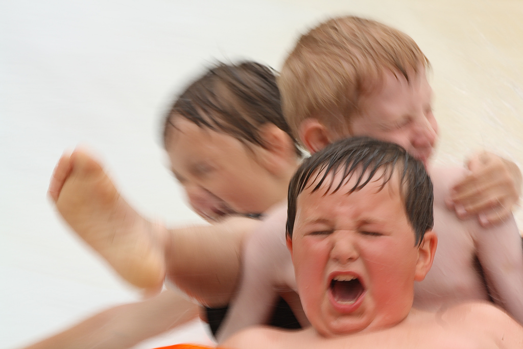 Kids on giant slip-n-slide by wsilver bad kids photo
